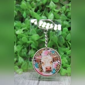 Whimsical Cow Keychain with Pink and Brown Accents